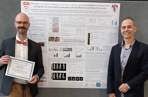 One of the first place winners at the Cancer Research Program (CRP) Research Day, May 3, 2019