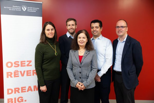 The Opal Health Informatics team, from left to right: Marie Hirtle, Dr. Tarek Hijal, Dr. Andréa Laizner, Dr. Jamil Asselah and Dr. John Kildea, accept the inaugural Trottier Webster prize from the MUHC Foundation on behalf of the Opal Health Informatics group (November 2019). Photo: MUHC