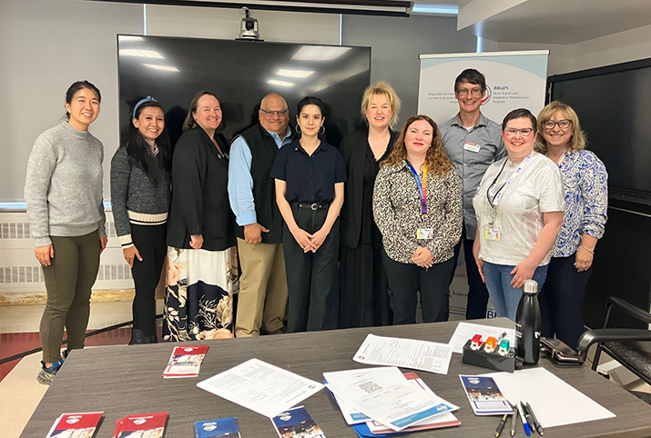 Trainees of the BRaIN Program participate in a dynamic Toastmasters event, enhancing their communication and leadership skills through collaborative learning and mentorship.