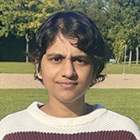 Risavarshni Thevakumaran, She/Her