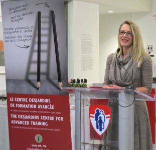 Julie Quenneville addresses research trainees at the December 11 event