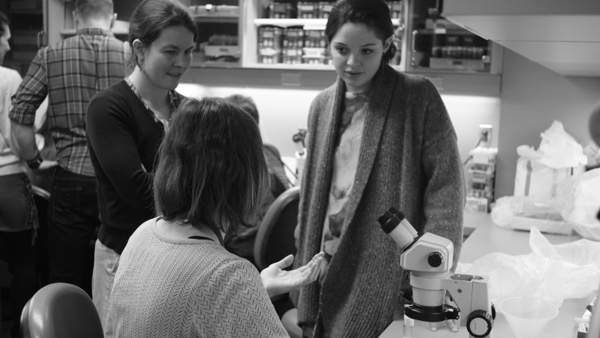 Dr. Emilie Peco explains her work to fine arts students Caroline Laurin-Beaucage (left) and Bettina Szabo (right). Photo: Kevin Jung-Hoo Park