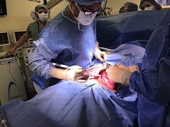 Researchers using the iStan patient simulator in the Experimental Operating Room