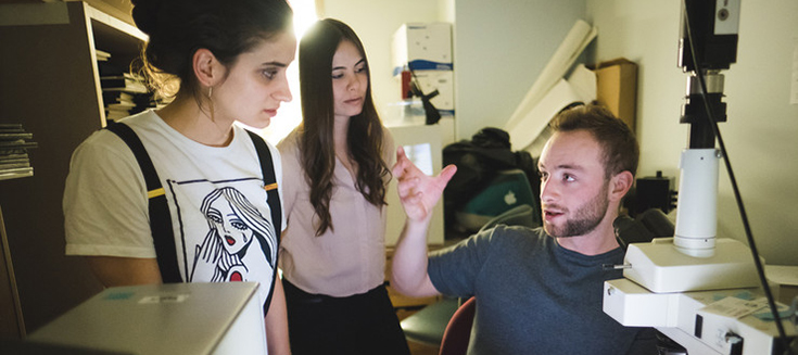Left to right: Concordia Fine Arts students Paméla Simard and Alexa Piotte, and Hunter S. Shaw, a doctoral student in biology at the Research Institute of the MUHC. Photo: Alex Tran
