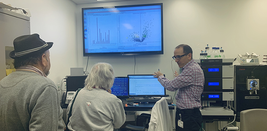Ari Gritsas, B.Sc., of the Proteomics Platform, describes how mass spectrometry can identify overexpressed proteins in cancer tissues (Behind the Scenes event at the Research Institute of the MUHC, November 13, 2019)